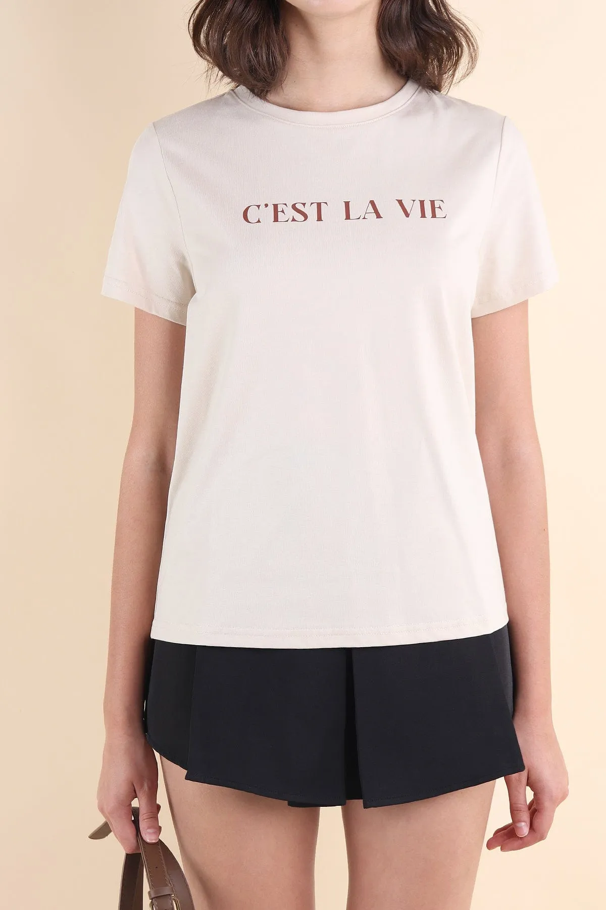 CEST LA VIE QUOTES TEE IN SAND